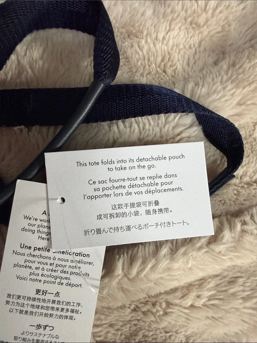 kate spade Navy Striped Tote multicolor stripes and includes detachable pouch